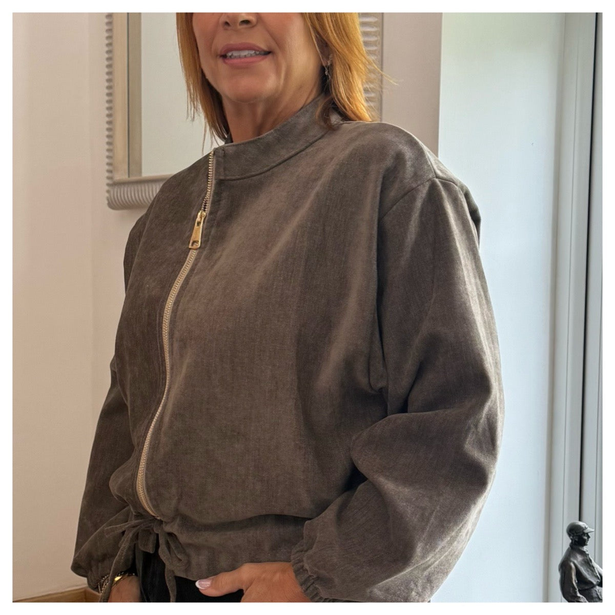 Mocha luxury-feel zip top with full zip front, drawstring waist and softly gathered cuffs